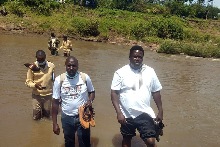 Project team in Kenya cross the river Migori