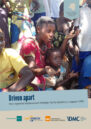 Front cover showing two children in a group of people.