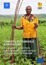 Front cover showing man in a field of crops