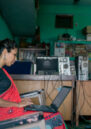 Unnati, a project participant, works in her office.
