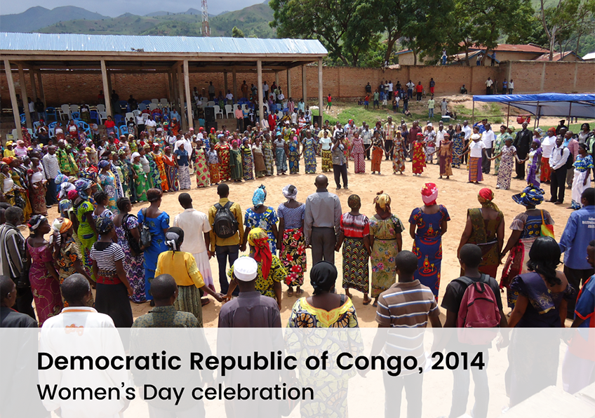 A large group of men and women gathered to celebrate International Women's Day in DRC, 2014