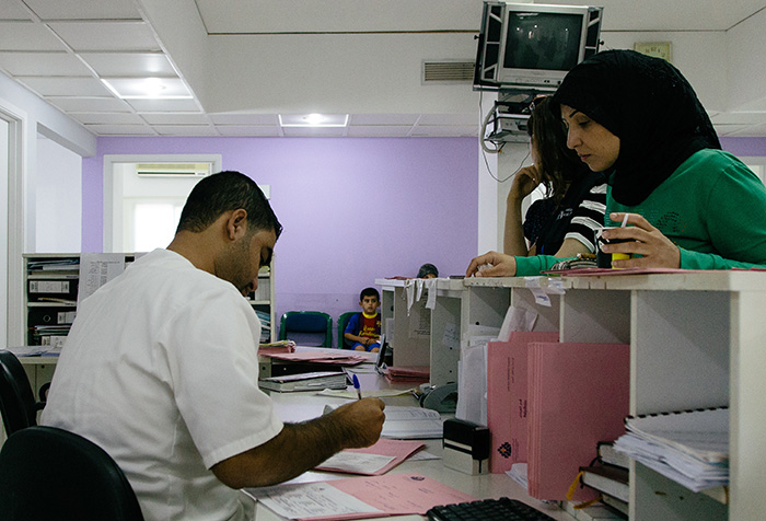 People in a health centre waiting room in Lebanon