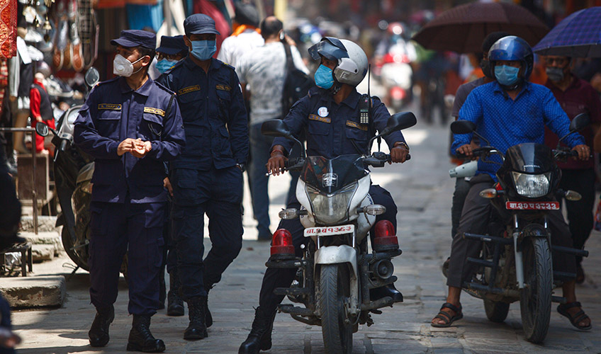 Police conduct COVID-19 inspections among shopkeepers in Nepal