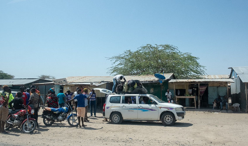 Kalokol residents transporting supplies.