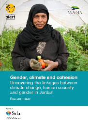 A Jordanian woman holding a tomato