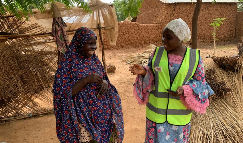 Zainab Aliyu (left) during a project visit with the Jireh Doo Foundation. Photo: Wesley Ahura / International Alert.