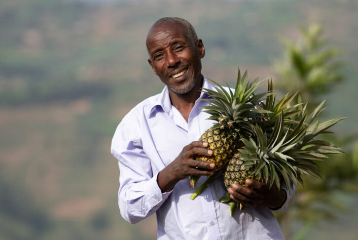 Alexis poses with pineapples