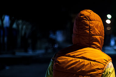 Man in street photo by Callum Francis Hugh