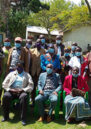 Members of the Kuria East District Peace Committee pose for group photo after one of the monthly DPC and community engagement forum at Kegonga Deputy County Commissioner’s office in Kuria East Sub-County.