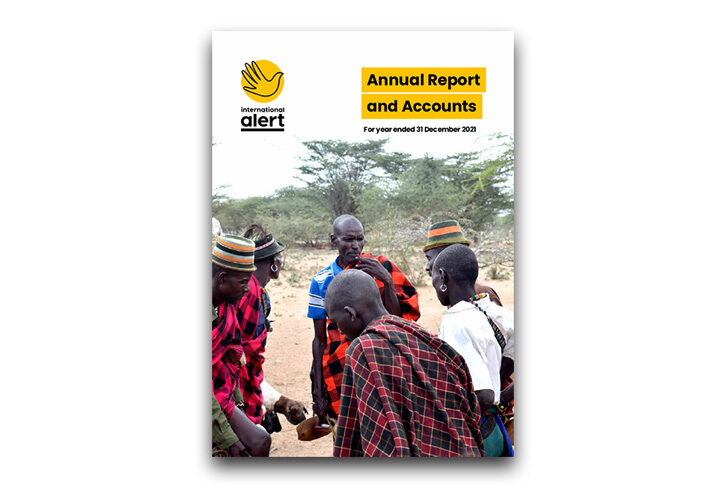 Cover of Annual Report showing elders engaging in dialogue over grievances arising from oil operations in Turkana county in Kenya.