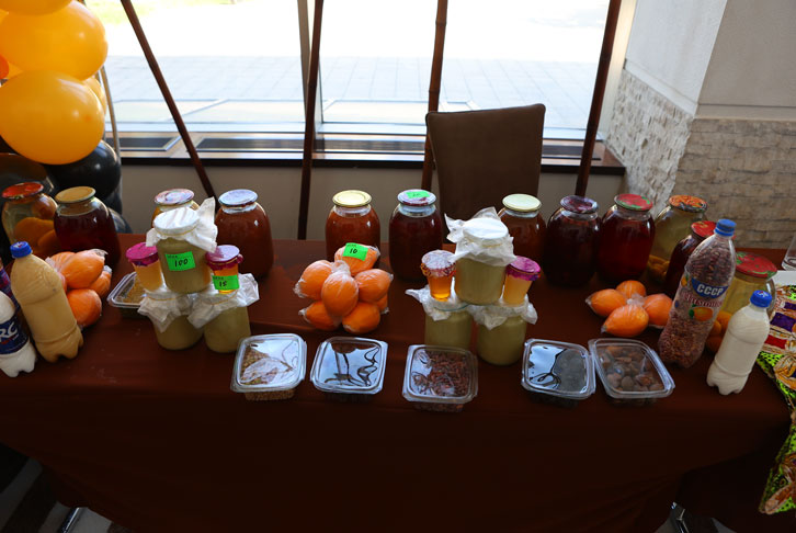 Table with products at International Alert International Women's Day event to celebrate the What Works project.