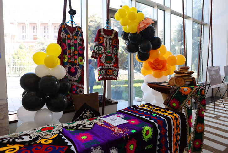 Table with textiles at International Alert Tajikistan's International Women's Day celebrations